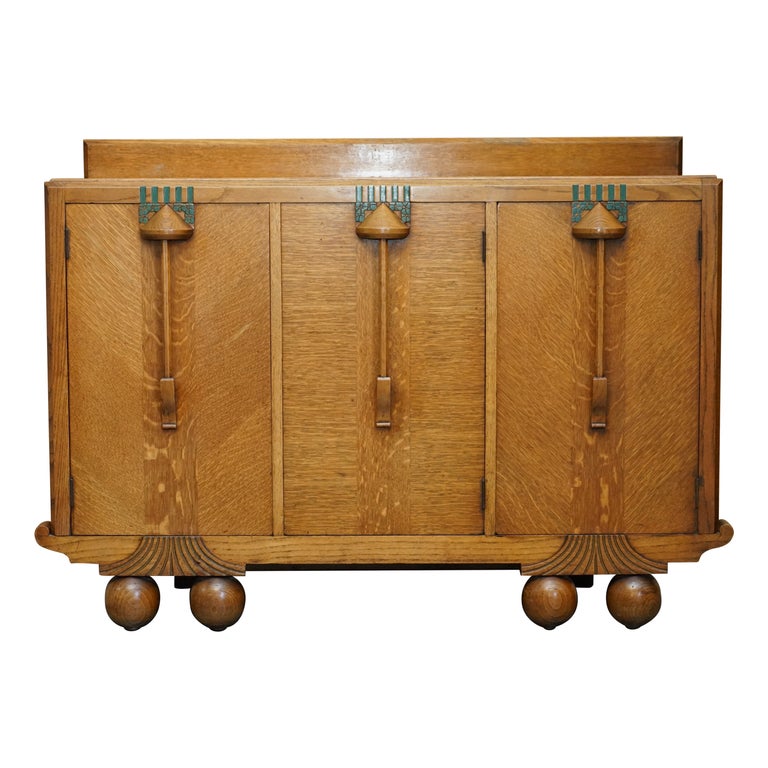 FINE LIBERTY’S COTSWOLD ART DECO OAK CARVED SIDEBOARD CIRCA 1920 PART OF A SUITE