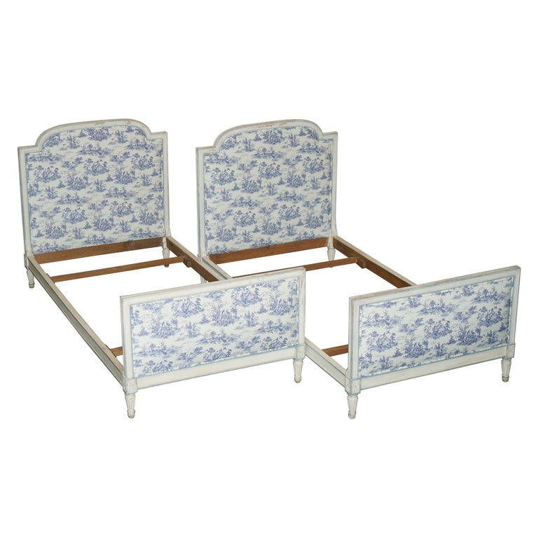 PAIR OF ANTIQUE FRENCH SINGLE BEDSTEAD FRAMES WITH TOILE DE JOUY UPHOLSTERY