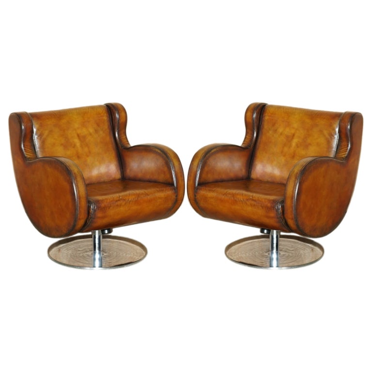 PAIR OF VERY COOL SUPER COMFORTABLE HAND DYED BROWN LEATHER SWIVEL ARMCHAIRS