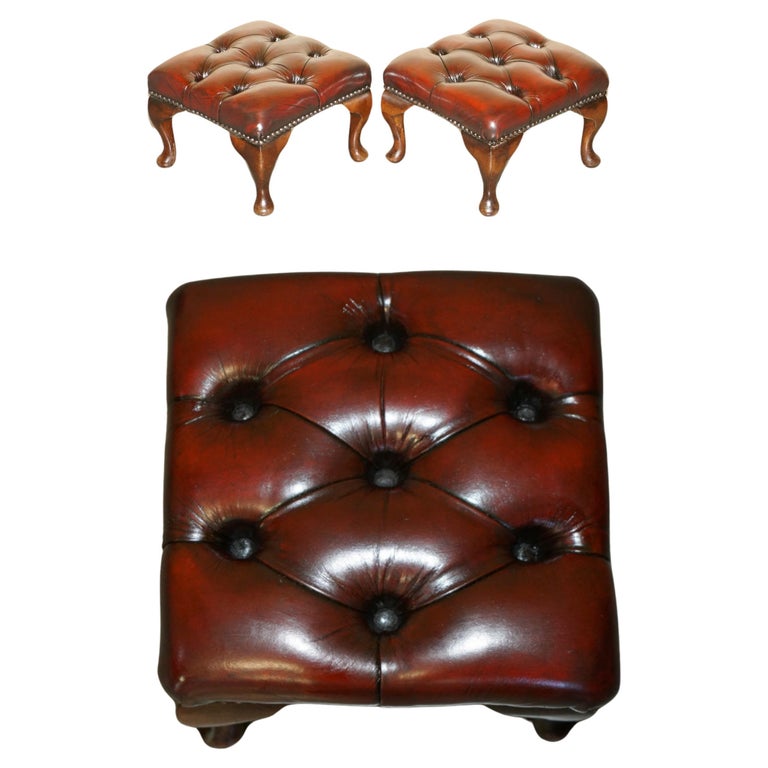 PAIR OF VINTAGE CHESTERFIELD TUFTED WINGBACK ARMCHAIR OXBLOOD LEATHER FOOTSTOOLS