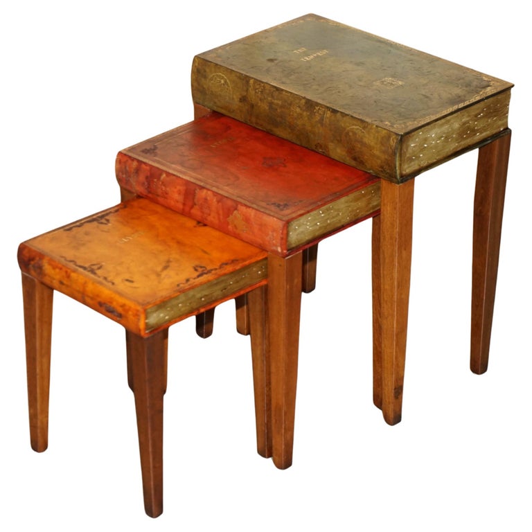 NEST OF VINTAGE FAUX BOOK TABLES IN ORIGINAL ANTIQUE DISTRESSED LEATHER