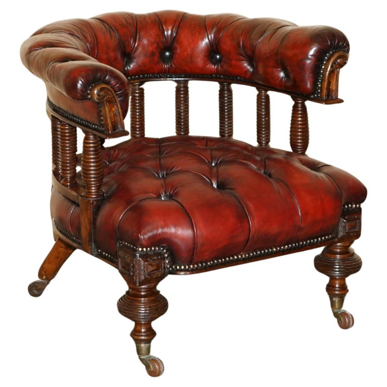 ANTIQUE RESTORED OXBLOOD CHESTERFIELD LEATHER CAPTAINS CHAIR FROM THE HIBERNIAN