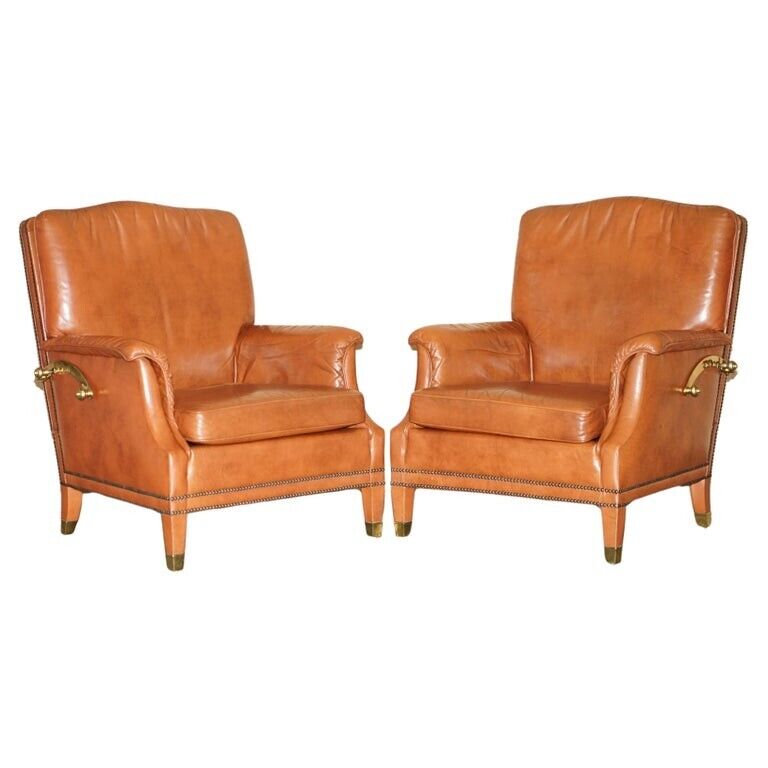 COMFORTABLE PAIR OF FRENCH NEOCLASSICAL STYLE LEATHER & BRASS RECLINER ARMCHAIRS