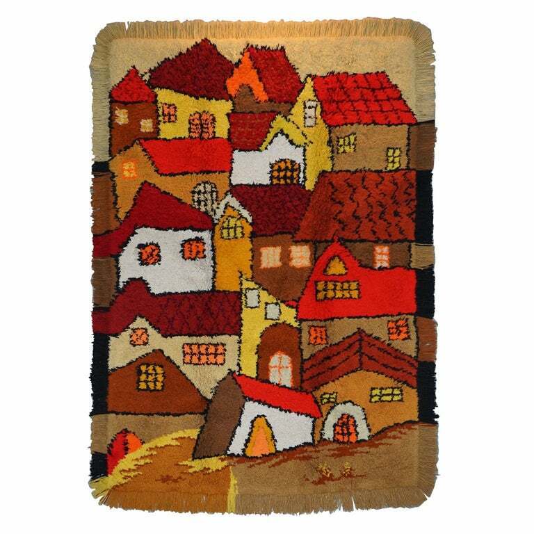 STUNNING LARGE SHAG PILE RUG DEPICTING HOUSES IN THE STYLE OF L.S LOWRY
