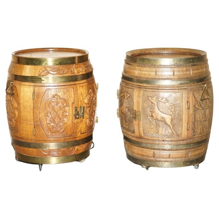 PAIR OF ANTIQUE CARVED SIDE TABLE SIZED BARRELS MADE INTO BARS / DRINKS HOLDERS