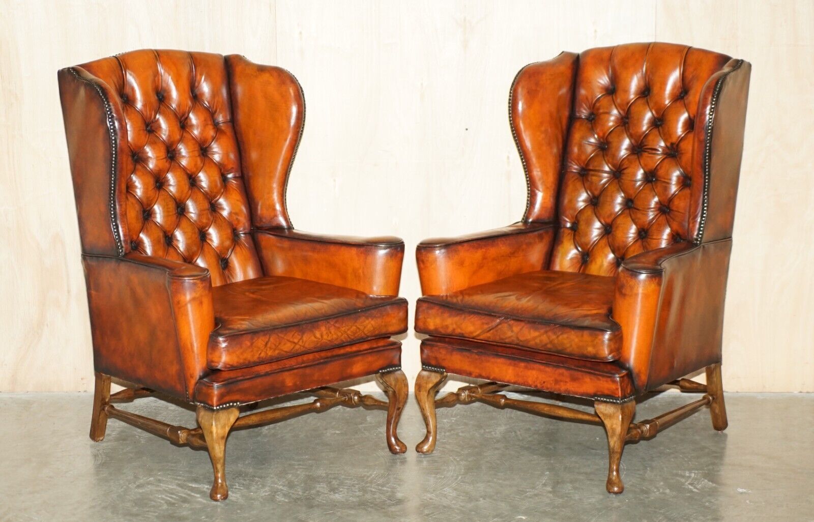 PAIR OF WILLIAM MORRIS CHESTERFIELD TUFTED WINGBACK BROWN LEATHER ARMCHAIRS