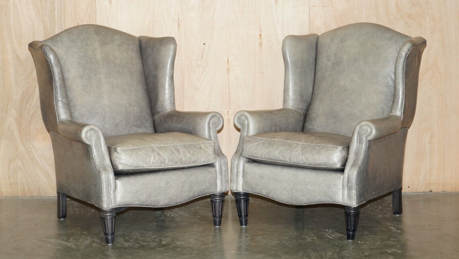 LUXURY PAIR OF CONTEMPORARY GREY BLUE LEATHER WINGBACK ARMCHAIRS EBONISED LEGS
