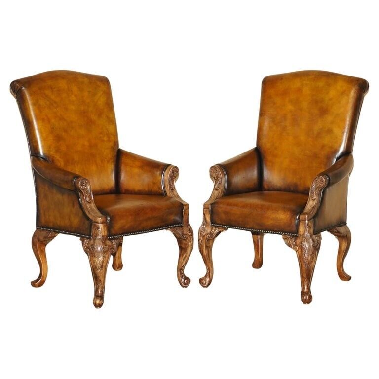 PAIR OF ANTIQUE HEAVILY CARVED HAND DYED BROWN LEATHER RESTORED THRONE ARMCHAIRS