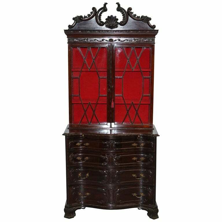 GEORGE III THOMAS CHIPPENDALE MAHOGANY BOOKCASE ON SERPENTINE CHEST DRAWERS