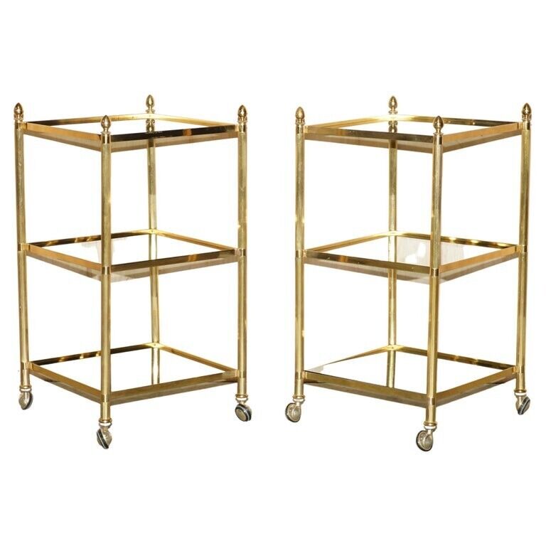 FINE PAIR OF MID CENTURY MODERN BRASS AND SMOKED GLASS THREE TIER ETAGERE TABLES
